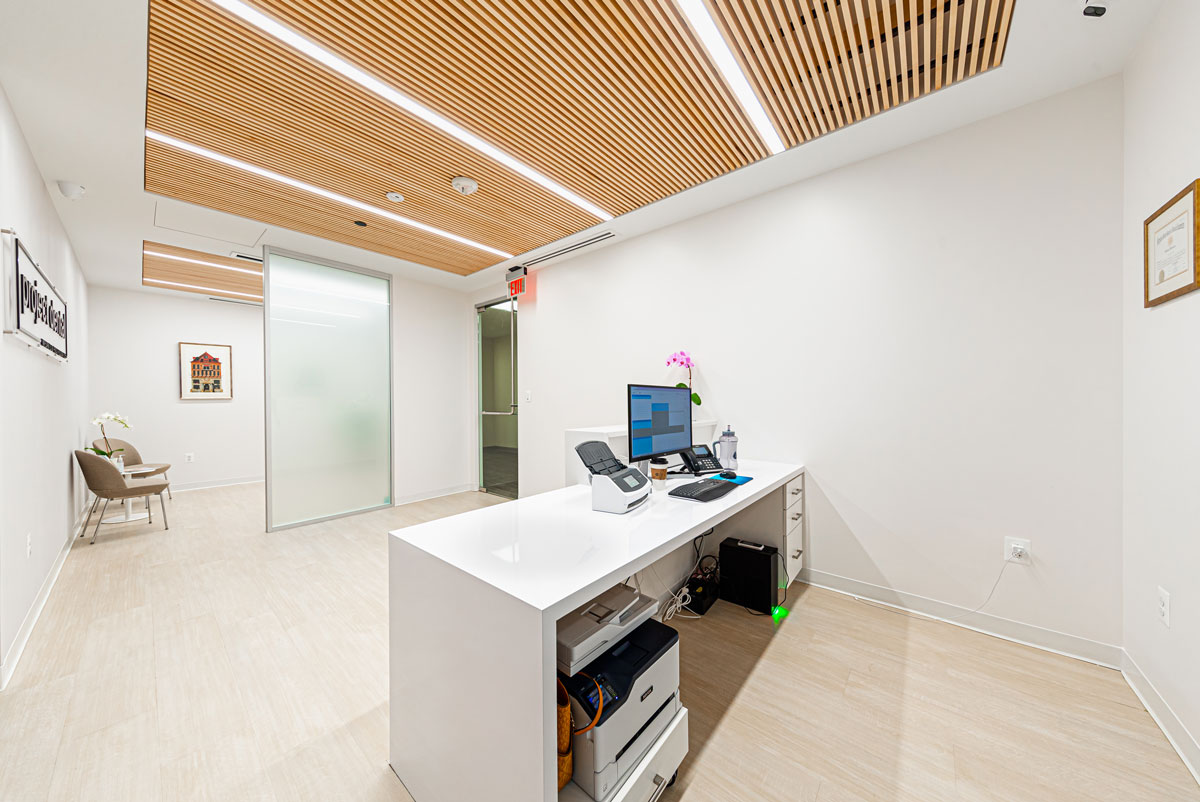 Project Dental Reception Area 39640 Project Dental sleek reception desk with computer and printer in Rockville, MD